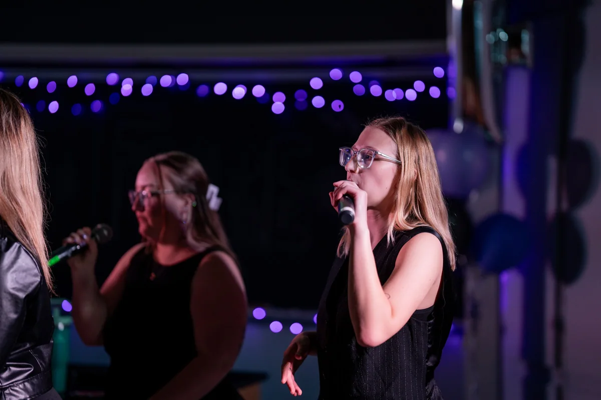 Vocalist under stage light